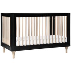 a black crib with white sheets and wood trims on the bottom half, in front of a white background