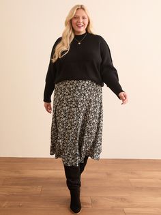 Maycie Floral Midi Skirt in Black Ivory Midi Skirts With Boots, Flowy Floral Print Skirt For Fall, Fall Floral Print Tiered Skirt, Floral Print Tiered Skirt For Fall, Tiered Floral Print Skirt For Fall, Fall Floral Print Flared Skirt, Floral Print Flared Skirt For Fall, Modest Long Skirt For Fall, Fall Floral Print Skirt