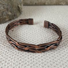 Intricate handmade braided copper cuff. Wears well with all sleeve lengths. Cuff width: 3/8 inch. Copper Jewelry Handmade Cuff Bracelets, Handmade Cuff Bracelets, Frit Painting, Copper Earrings Handmade, Unique Handcrafted Jewelry, Copper Jewelry Handmade, Copper Cuff, Ancient Jewelry, Wire Bracelet