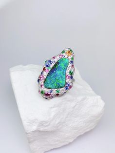 Item Information opal:              4.45cts Weight :         10.77g Size :              30×19mm Weight (diomand):  0.80cts Weight (other gems):  1.41cts Dual use ring and pendant Attention：All Opal stones are from Australia, and some of the finished products are designed and processed in China.So Opal products in my store are delivered by Chinese factories. More Affordable price，Only make a reasonable profit，So I can offer a high quality item and affordable price for every customers， Better service ，if you have any problem with my item，please feel free to contact me， I will try my best to solve it. Free EMS Luxury Opal Rings With Gemstone Accents, Luxury Opal Ring With Diamond And Gemstone Accents, Luxury Diamond Opal Ring With Gemstone Accents, Elegant Multi-stone Opal Gemstones, Luxury Opal Cabochon Jewelry, Luxury Green Multi-stone Opal Ring, Luxury Multi-stone Opal Anniversary Ring, Luxury Multi-stone Opal Ring For Anniversary, Luxury Opal Ring With Gemstone Accents For Anniversary