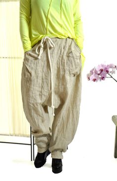 "Harem Pants Linen, Women Linen Pants, Beige Pants ☆ Woman summer pants ☆ NEW collection! Beige 100% pants of high quality eco linen. The pants are very comfortable. These pants are both sports and everyday. You can go to work with them, you can also wear them in the free days. Loose fitting. Model wearring size M Color : Natural The style was originally designed and professionally constructed by me. Each item of my shop is specially packaged with a lot of concern! Handmade in a pet-free and smo Baggy Linen Pants, Women Linen Pants, Oversized Cargo Pants, Loose Linen Pants, Bohemian Pants, Summer Pants Women, Pants Linen, Drop Crotch Pants, Harem Pants Women