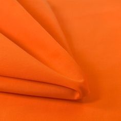 an orange sheet that has been folded up