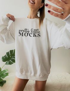 White Cotton Sweatshirt With Letter Print, White Cotton Sweatshirt With Text Print, White Crew Neck Sweatshirt With Text Print, White Text Print Sweatshirt For Loungewear, Basic White Sweatshirt With Branding, White Casual Sweater With Letter Print, White Sweatshirt With Lettering For Loungewear, Casual White Sweater With Text Print, White Casual Sweatshirt With Lettering