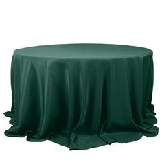 a green table cloth with ruffled edges is shown in front of a white background