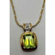 This is part of Chairish’s Fine Jewelry assortment.  14k Yellow Gold & Peridot Pendant & Necklace. Weight: 5 grams Weight of Chain: 3.2 grams Weight of Pendant: 1.8 grams  Chain Lth: 16 in.  Peridot: approx. 8.09 mm x 6.27 mm Fine Jewelry Peridot Necklace For Anniversary, Formal Peridot Gemstone Necklaces, Formal Peridot Pendant Necklace, Formal Yellow Gold Peridot Necklaces, Formal Yellow Gold Peridot Necklace, Fine Jewelry In Gold With Peridot, Gold Peridot Fine Jewelry, Fine Jewelry Gold Peridot, Fine Gold Peridot Jewelry