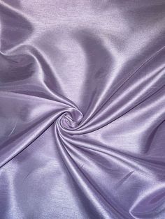 a close up view of a purple fabric