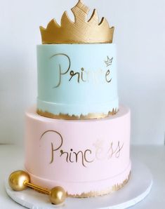 a three tiered cake decorated with gold and blue frosting, featuring the word princess on top