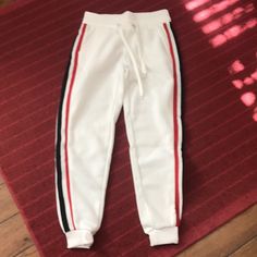 Nwt. White/ Black & Red Striped . Medium Ribbed Waist &. Ankle White Sweatpants For Winter Jogging, White Winter Sweatpants For Jogging, Stretch Sweatpants With Side Stripes For Loungewear, White Bottoms For Jogging In Winter, White Winter Joggers For Jogging, Winter White Joggers For Jogging, White Stretch Joggers For Loungewear, White Fitted Joggers Sportswear, Fitted White Joggers Sportswear