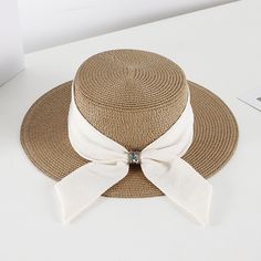 Product Category: Straw HatPopular elements: skirts, bows, tassels, irregular, plaid, squares, double rings, chains, asymmetryFor the season: SummerHat style: domeHat brim style: wide brimColor: khaki, black, pink, beige, pure white, ivory, redSize: M (56-58cm)Function: sun protection, neck protection, breathable, warm, windproof, sunshade, insect-proofSuitable for the crowd: adults, middle-aged, middle-aged, young, couples, students, women, menFabric name: StrawStyle classification: fresh and sweetStyle: adult straw hat, sun hat, sun hat, sun protection hat, beach hat Elegant Boater Hat For Vacation, Chic Straw Hat For Picnic, Elegant Straw Hat For Spring Picnic, Elegant Summer Hat For Picnic, Elegant Spring Hats For Picnic, Brimmed Boater Hat For Picnics, Elegant Fedora Sun Hat With Bow, Chic Boater Hat With Ribbon For Beach, Chic Adjustable Hat With Bow