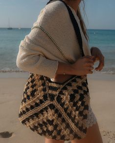 All things Raffia Braided Crochet Bag For Beach Travel, Black Woven Beach Bag Made Of Natural Fiber, Trendy Woven Leather Beach Bag, Bohemian Black Shoulder Bag For Beach Season, Black Bohemian Shoulder Bag For Beach Season, Trendy Woven Leather Bag, Handwoven Black Shoulder Bag For Beach Season, Black Straw Shoulder Beach Bag, Natural Woven Leather Bag For Beach Season