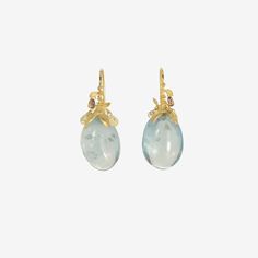 Details Gabriella Kiss 18k yellow gold & tumbled clear blue aquamarine Eggplant earrings with diamond briolettes. Each stone measures approximately 7/8″ x 1/2″ & is set in Gabriella’s signature eggplant setting. When hanging, the earrings measure approximately 1 3/8″ from the top of the ear wire to the bottom of the earring. - aquamarine, 60ct - diamond briolettes, 1.5ct - 18k yellow gold - 1 3/8" total length - each earring weighs approximately 5.84g Luxury Drop Multi-stone Jewelry, Formal Multi-stone Drop Jewelry, Luxury Blue Aquamarine Earrings, Luxury Aquamarine Blue Earrings, Luxury Blue Topaz Yellow Gold Jewelry, Luxury Yellow Gold Jewelry With Blue Topaz, Luxury Yellow Gold Blue Topaz Jewelry, Light Blue Gemstone Earrings - Fine Jewelry, Aquamarine Teardrop Jewelry For Formal Occasions