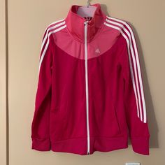 Brand New Unused Adidas Track Jacket Girls Size 13-14, Women Firs For Size 2-4 Pink Adidas Sports Outerwear, Pink Adidas Long Sleeve Outerwear, Adidas Pink Long Sleeve Outerwear, Pink Adidas Winter Outerwear, Pink Adidas Sporty Outerwear, Sporty Pink Adidas Outerwear, Pink Adidas Track Jacket For Spring, Adidas Pink Track Jacket For Spring, Adidas Track Jacket