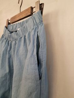 Women's Linen Hemp Banding Waist and Hem Pants Size One size, good for US size 4-12 good up to 34 inches of waist Waist 30cm / 11.8inches Length 86cm / 33.8inches Fabric and Care Linen 50% Hemp 50% Hand washing and line dry recommended Made in S Korea Summer Baggy Pull-on Bottoms, High Waisted Stretch Linen Bottoms, High Waist Stretch Linen Bottoms, Non-stretch Cotton Bottoms With Pull-on Style, Straight Pants With Hip Pockets For Summer, Summer Straight Pants With Hip Pockets, Baggy High Waist Capris With Elastic Waistband, High Waist Baggy Capris With Elastic Waistband, Stretch Linen Bottoms With Pockets