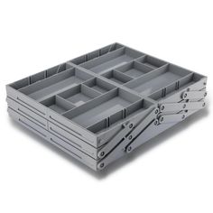 four plastic trays with dividers on each side