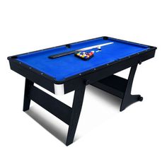 a blue pool table with two cues and a ball on it's end, in front of a white background