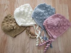 This beautiful bobble bonnet is just perfect to keep those little ears warm. It is made from 100% acrylic yarn so it is washer and dryer safe. Made in a smoke free home. Many colors available. If you don't see your color choice, please message me. Baby Winter Hat, Baby Winter Hats, Baby Bonnets, Baby Bonnet, Hat Baby, Gender Neutral Baby Clothes, Baby Hat, Baby Winter, Ear Warmers