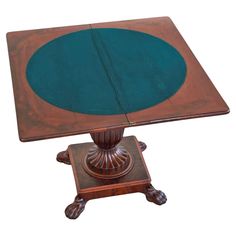 a wooden table with a green top on it