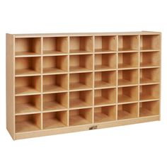 a large wooden shelf with many compartments