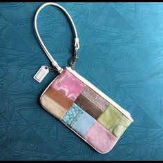 Super Cute Coach Wristlet With Patches Of Color And Coach Embroidery On Both Sides. Zipper Works Perfectly And Inside Is Clean. Nearly Brand New Coach Rectangular Zipper Pouch, Rectangular Coach Zipper Pouch, Coach Multicolor Clutch Bag, Multicolor Coach Clutch Bag, Coach Multicolor Travel Wristlet, Coach Rectangular Clutch With Zipper Closure, Coach Rectangular Clutch, Coach Multicolor Wristlet For Travel, Multicolor Coach Wristlet For Travel