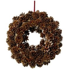 a wreath with pine cones hanging from it