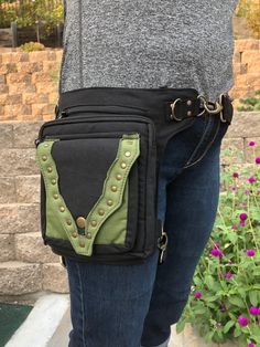 Looking for a purse? Looking for a fanny pack? Well, THIS bag can be both! :) ➼ Can be worn as an efficient fanny pack OR a crossbody bag! ➼ Gorgeous gold studs! ➼ For jogging, running, hiking, dog walking, shopping, running errands, and more! ➼ Leg Belt for extra security! ➼ Adjustable Belt Length (Waist/Hip/Shoulder): 36 inches - 56 inches ➼ Adjustable Leg Belt (removable, too 13 inches - 22 inches ➼ Pack Dimensions: 10 inches X 8 inches ➼ FOUR TOTAL COMPARTMENTS! - Compartment on Front (close Outdoor Shoulder Belt Bag With Cell Phone Pocket, Multifunctional Black Chest Bag With Multiple Pockets, Black Multifunctional Belt Bag With Zipper Pocket, Multifunctional Black Belt Bag With Zipper Pocket, Multifunctional Shoulder Belt Bag With Cell Phone Pocket, Multifunctional Belt Bag With Cell Phone Pocket, Rectangular Outdoor Belt Bag With Pockets, Outdoor Belt Bag With Zipper Pocket, Everyday Backpack Belt Bag With Pockets