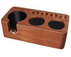 a wooden box with three holes in the middle and one hole at the top that is open