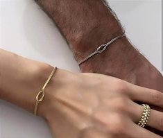 Description:   Love Knot Bracelet - Dainty Couple Bracelets -İnitial Bracelet - İnfinity Bracelet -  Sterling Silver Friendship  Jewelry - Best Friend Gift -  Gift for Couples - Love Knot Bracelet -   Personalized Bracelet   - Couples Jewelry   - Gift for mom - Love Knot Bracelet  -  Couple Bracelet -  Boyfriend Girlfriend Matching - Unisex Bracelet -  Love Knot Soulmate - Couples Bracelet - Birthday Gift - Bridesmaid Gift - Anniversary Gift - Valentines Gift -  --Our product is produced with care from 925 carat high quality silver. Snake chain is used in double bracelets. Our Bracelets:       Bracelet Length : 6.8 inch + 2 inch Extension ring (17 CM+5 CM)                       *Love Knot Necklace :16 İnch + 2 İnch Extension Ring     (40 CM+5 CM) -It is suitable for daily use. -All your or Him And Her Bracelets, Boyfriend And Girlfriend Jewelry, Promise Bracelet For Couples, Engagement Bracelets, Boyfriend Jewelry, Matching Jewelry For Couples, Love Knot Bracelet, Bracelet Boyfriend, Bracelet Couples