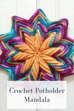 the crochet potholder is made with multicolored yarn and has a star shaped