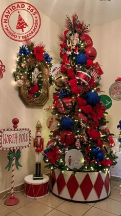 a christmas tree decorated with red, white and blue ornaments