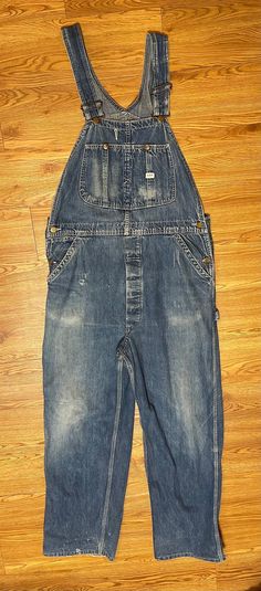 From the magical Red Rock country of Sedona, Arizona, BlackbirdSedona presents to you this amazing pair of 1950's Lee Denim overalls. Measured size is 36 x 30. Sanforized. Made in USA. Donut hole buttons. Amazing details. Please look at photos closely. Some holes and stains. Please ask any questions through messages. Since this is a vintage item, all sales are Final and returns are not accepted. Please visit our Brick and Mortar location while in Sedona! Donut Holes, Sedona Az, Lee Denim, Sedona Arizona, Union Made, Warm Sweaters, Red Rock, Denim Overalls, Sedona