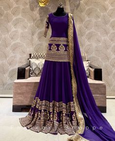 Made to Order/Measurement/Custom Order Lehenga - Color : purple  - Fabric : embroidered Georgette  - Fully flared paneled lehenga -   Attached  Dupatta with Blouse - Drawstring closure with Tassels - - It can be customize in any design or size  PLEASE NOTE: BUYERS ARE RESPONSIBLE FOR ANY CUSTOMS AND IMPORT TAXES THAT MAY APPLY. This is a made to order product. If you opt for 'Made To Measurement Option', we will provide a measurement template and you can share the measurements likewise. If you want to opt for 'Standard Size', Please refer to the size chart provided in the listing. Shipping: Standard Shipping is done by DHL ecommerce and it mostly takes 2 to 3 weeks to deliver after dispatch. Express Shipping is done by DHL express and it mostly delivers within a week after dispatch. Fabric Purple Garara Dress, Purple Sharara Designs, Georgette Lehenga For Reception, Long Semi-stitched Choli For Diwali, Festive Long Lehenga With Dori Work, Unstitched Long Sharara For Reception, Long Sharara For Diwali Reception, Bollywood Style Long Sets For Reception, Semi-stitched Long Anarkali Lehenga