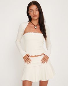 Ivory Rib Shrug Top | Suri – motelrocks-com-us Fitted White Long Sleeve Top For Winter, Fitted Off White Knit Top, Fitted White Ribbed Long Sleeve Top, Fitted White Long Sleeve Ribbed Top, Fitted Cream Sweater, Fitted Winter White Sweater, Fitted Off White Sweater For Spring, Cream Ribbed Fitted Sweater, Fitted Cream Knit Top For Spring