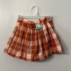 Plaid Skirt With Shorts Underneath. More Colors Available! School Mini Skirt With Lining, School Plaid Pleated Skirt, Pleated Skirted School Bottoms, School Skirted Pleated Bottoms, Fall School Skort, Plaid Bottoms For School In Fall, Cute School Tennis Skirt For Spring, Cute Tennis Skirt For School In Spring, Trendy Skirted Skort For School