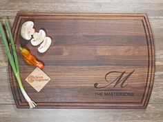 a cutting board with mushrooms and chopsticks on it