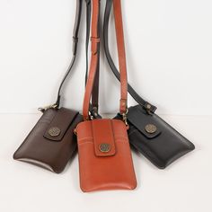 Crafted with the design DNA of equestrian heritage, the Austin Cognac Phone Tote embodies a perfect blend of style and functionality. Made from luxurious Italian leather, it transforms from a sleek phone wallet to a crossbody leather bag with an adjustable strap. Featuring a secure Horseshoe Medallion snap, hidden credit card slots, and additional space on the reverse side, it's designed for ease and elegance. Finished with a functional and stylish easy wear, it's ideal for any occasion. Materia Modern Equestrian, Crossbody Leather Bag, Lucky Horseshoe, Leather Hardware, Black Phone, Deep Brown, Signature Print, Phone Wallet, Phone Bag