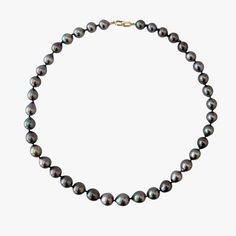 Embrace the allure of this exquisite Tahitian Pearls necklace, elegantly held together with a 14K Yellow Gold interlocking clasp. This beautiful necklace spans a length of 18" (~46cm), with a substantial weight of 47.8g, that affirms its quality and durability. The colors of these pearls are a testament to the wonders of nature. These cultured Tahitian pearls present a spectrum of 100% natural colors, including Purple, Cherry, and Green Cherry hues. These colors are further accentuated with char Luxury Tahitian Pearl Round Bead Necklace, Classic Tahitian Pearl Round Bead Necklaces, Classic Tahitian Pearl Round Bead Necklace, Classic Tahitian Pearl Beaded Necklace, Tahitian Pearl Round Beads Formal Necklace, Formal Tahitian Pearl Necklaces With Round Beads, Formal Single Strand Tahitian Pearl Necklace, Formal Tahitian Pearl Round Bead Necklaces, Classic Tahitian Pearl Jewelry With Round Beads