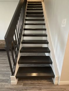 a set of stairs leading up to the second floor