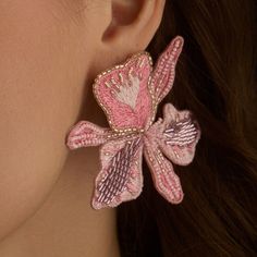 Details: oversized floral studs beaded pink lightweight materials: imitation rhodium plated brass stainless steel post Measurements: 2.75" L Embroidered Felt Earrings, Spring Feminine 3d Flowers Jewelry, Spring Jewelry With 3d Flowers, Feminine Blossom Jewelry For Spring, Handmade Flower Earrings For Spring, Spring Wedding Rose Gold Jewelry, Spring Wedding Jewelry With 3d Flowers, Spring Wedding Jewelry With Petal Design, Spring Flower Earrings With Handmade Flowers