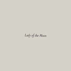 lady of the moon written in black ink on a gray background with an arrow pointing to it