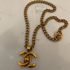 Chanel Double Turn Lock Necklace 24k Gold Plated Cc Turn Lock Pendant 21" Length Vintage Item In Excellent Condition -Some Running On Small Turn Lock To Open And Close Necklace From Use -24k Pendant In Great Condition Collector's Item And Wearable! 100% Authentic Chanel Jewelry Chanel, Lock Pendant, Lock Necklace, Chanel Jewelry, Womens Jewelry Necklace, Vintage Items, Gold Plate, Chanel, Jewelry Necklaces