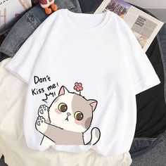 This Kawaii Cartoon T-Shirt Melts Every Cat Lover's Heart 🥰, kiss your cat now! This Oversized Unisex Cartoon Cat T-shirt has a "Kawaii" (adorable) cat printed on it, with "Don't Kiss Me" words. Yes, your cat may hate your from kissing it but... Cat Sweatshirt, Cat T Shirt, New Students, Cartoon T Shirts, Cat T, Brick Red, Mongolia, Harajuku Fashion, Cute Tshirts