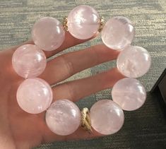 Material:Rose quartz beads size :24mm   quantity: one strand  6mm approx 29 pcs one strands 7mm approx25 pcs one strands 8mm approx 22 pcs one strands 9mm approx 21pcs one strands 10mm approx 19 pcs one strands 11mm approx 18pcs one strands 12mm approx 16 pcs one strands 13mm approx 16 pcs one strands 14mm approx 15 pcs one strands 15mm approx 14pcs one strands 16mm approx 14 pcs one strands 17mm approx 13pcs one strands 18mm approx 13pcs one strands 19mm approx 12pcs one strands 20mm approx 12p Pink Crystal Bracelet With Natural Round Beads, Pink Crystal Bracelet With Natural Stones, Pink Crystal Bracelet With Round Natural Stones, Pink Natural Stones Crystal Bracelet, Elegant Rose Quartz Crystal Bracelet With Round Beads, Round Rose Quartz Crystal Bracelet, Beaded Rose Quartz Crystal Bracelet, Pink Hand-strung Round Crystal Bracelet, Pink Bracelets With Polished Beads