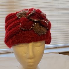 Women's Nwt Fashion Winter Hat. Hat Has Silver Studs Around A Knitted Flower. Hat Is Knitted. Acrylic Hats One Size Fits Most, Knitted Brimmed Cloche Hat One Size, One Size Knitted Brimmed Cloche Hat, Red One Size Beanie Hat, Red Knitted Beanie One Size, Red Knitted Hat For Fall, Red Knitted Beanie (one Size Fits Most), Knitted One Size Mini Cap, One Size Knitted Mini Cap