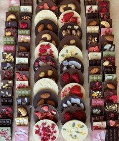 a table topped with lots of different types of desserts