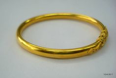 22k Gold Temple Jewelry Bangle, Formal 22k Gold Hallmarked Bangle, Gold Temple Jewelry Bangle In 22k, Gold 22k Temple Style Bangle, Gold 22k Temple Jewelry Bangle, Gold Temple Jewelry Bracelets, Yellow Gold Bangle Cuff Bracelet For Festivals, Yellow Gold Bangle For Festivals, 22k Gold Round Bangle For Formal Occasions