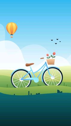 a blue bicycle with flowers in the basket is parked next to a lake and hot air balloon