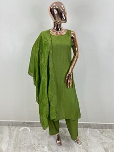 Green Solid Silk Sleeveless Kurta With Trousers & Dupatta Pakistani Salwar Kameez / Indian Wedding Dress / Plus Size Cotton Dress Traditional Indian Wear / Salwar Kameez Dupatta / Kurti Palazzo Set The set contains: 1 Straight Kurta 1 Palazzos 1 Dupatta Kurta: The solid green Kurta has a band collar design with button details. The Kurta measures till calf length and has straight hemline. Sleeve length :  Sleeveless Trousers :  Solid Trousers has partially elasticated waistband and slip on closur Festive Summer Straight Kurta Pant Set, Summer Pant Set With Straight Kurta And Dupatta, Summer Pant Set With Dupatta And Straight Kurta, Festive Palazzo Set With Sheer Dupatta For Summer, Sheer Dupatta Palazzo Set For Festive Summer, Green Bollywood Pant Set With Resham Embroidery, Summer Festive Palazzo Set With Sheer Dupatta, Green Fitted Designer Pant Set, Pista Green Summer Party Sets