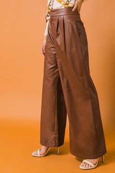 Add effortless style to your wardrobe with these Matched Energy Leather Pants. Crafted with a faux leather fabric, they feature a wide waistband with hook & eye and zipper closure, plus a pleated front detail. These pants are the perfect addition to any night-time look. Details Self: Backing: 100% Polyester Coating: 100% Polyurethane Size & Fit - Model is 5`8" And Wearing Size Small - Measurements Taken From Size Small - Approx. Length: 45" Fall Closet, Longline Cardigan, Leather Pant, Wide Waist, Pants Large, Faux Leather Fabric, Faux Leather Pants, Hook Eye, Wide Waistband