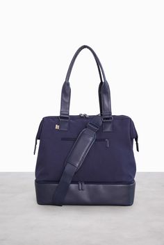 The Mini Weekender in Navy | Beis Travel – Béis The Minimalists, Suitcase Handle, Mini Blue, Dog Clip, Weekender Tote Bag, Weekend Bag, Overnight Bag, Travel Pouch, Nylon Bag