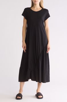 An asymmetric ruffle brings contemporary flair to a flowy maxi dress cut from soft and breathable cotton. Crewneck Short sleeves 100% cotton Machine wash, dry flat Imported Cotton A-line Maxi Dress With Ruffles, Casual Solid Midi Dress With Asymmetrical Hem, Black Maxi Dress With Relaxed Fit For Spring, Black Relaxed Fit Maxi Dress For Spring, Spring Maxi Dress With High-low Hem, Flowy Solid Cotton Maxi Dress, Flowy Cotton Maxi Dress In Solid Color, Solid Cotton Flowy Maxi Dress, Solid Cotton Maxi Dress With Flowy Fit